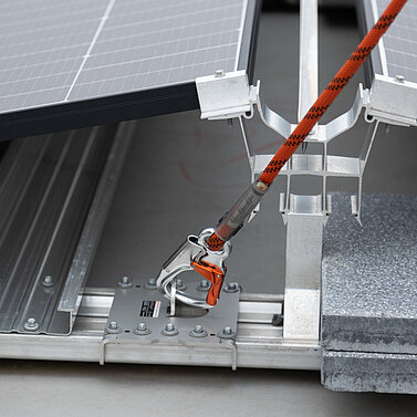 Fall protection system and photovoltaic equipment in combination