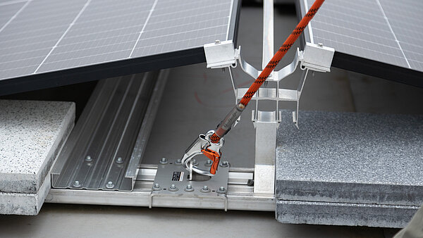 Fall protection system and photovoltaic equipment in combination